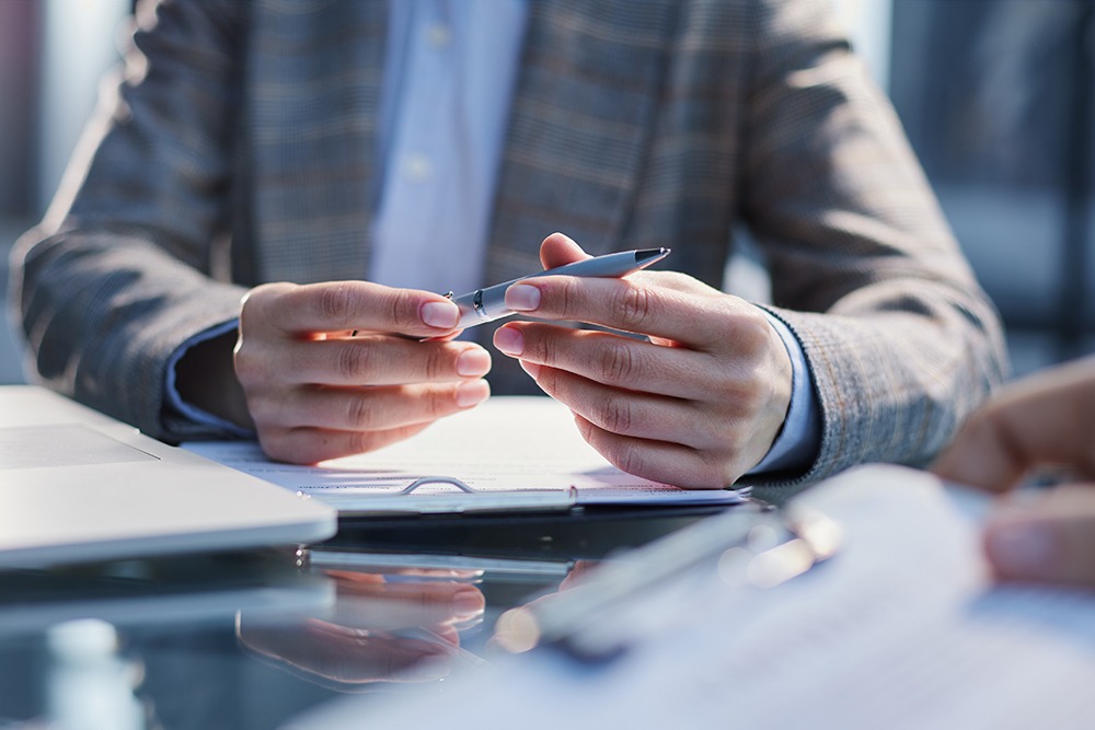 A business owner consulting with a DuFault Law attorney to determine the best corporate structure for their company under Business Law, Corporate Law, and Commercial Law in Florida and Georgia.